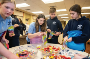 13 2024.03.29 Students preparing Easter backpacks