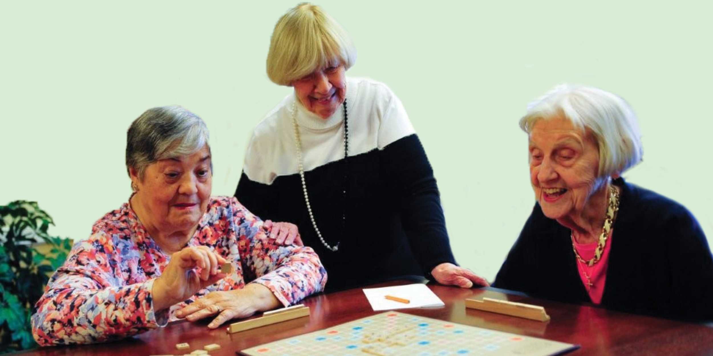 Residents playing a board game