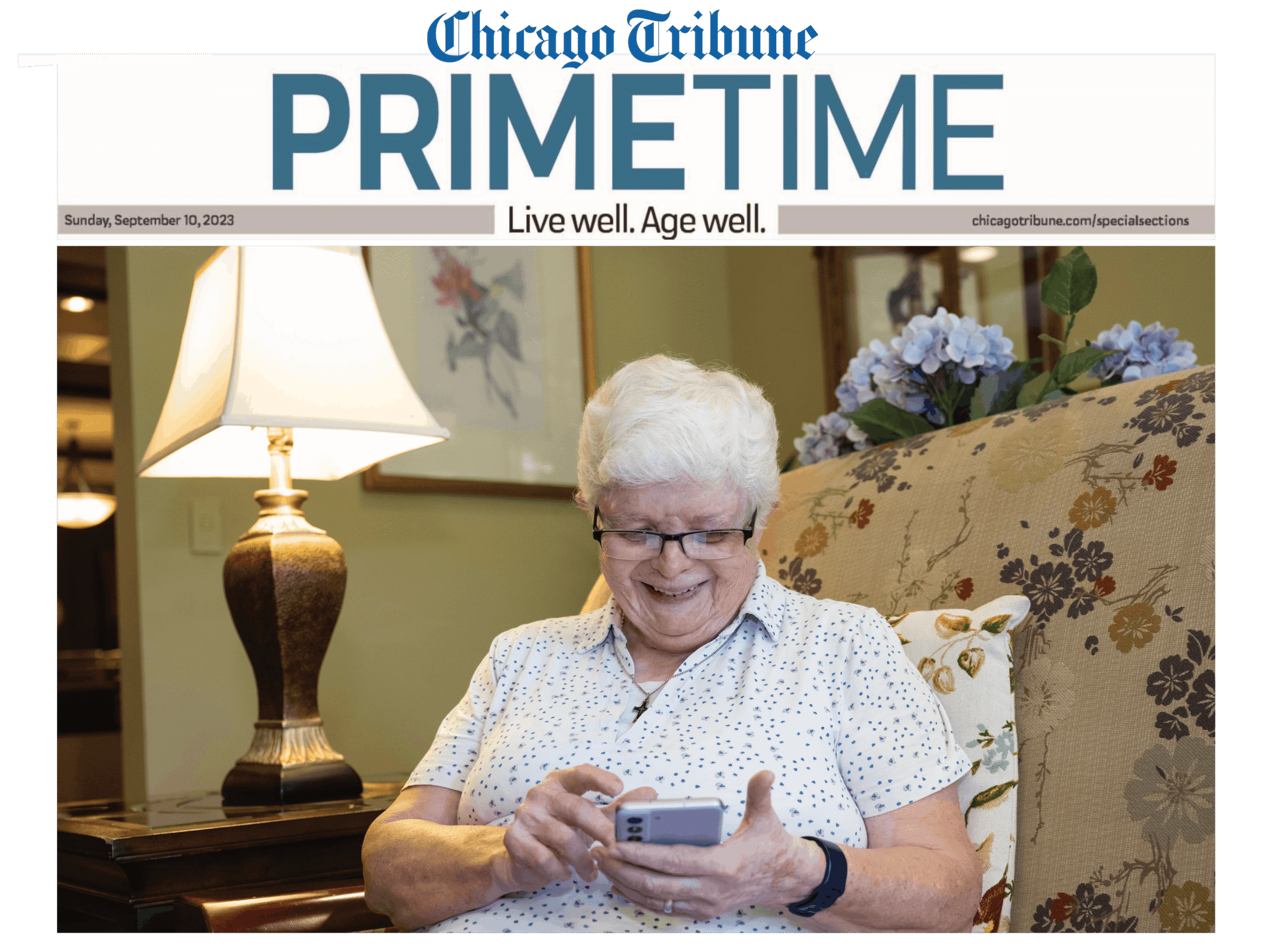 Mercy Circle resident using smart phone