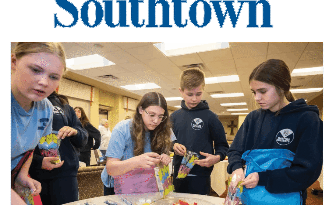 Queen of Martyrs Students Assemble Easter Packs