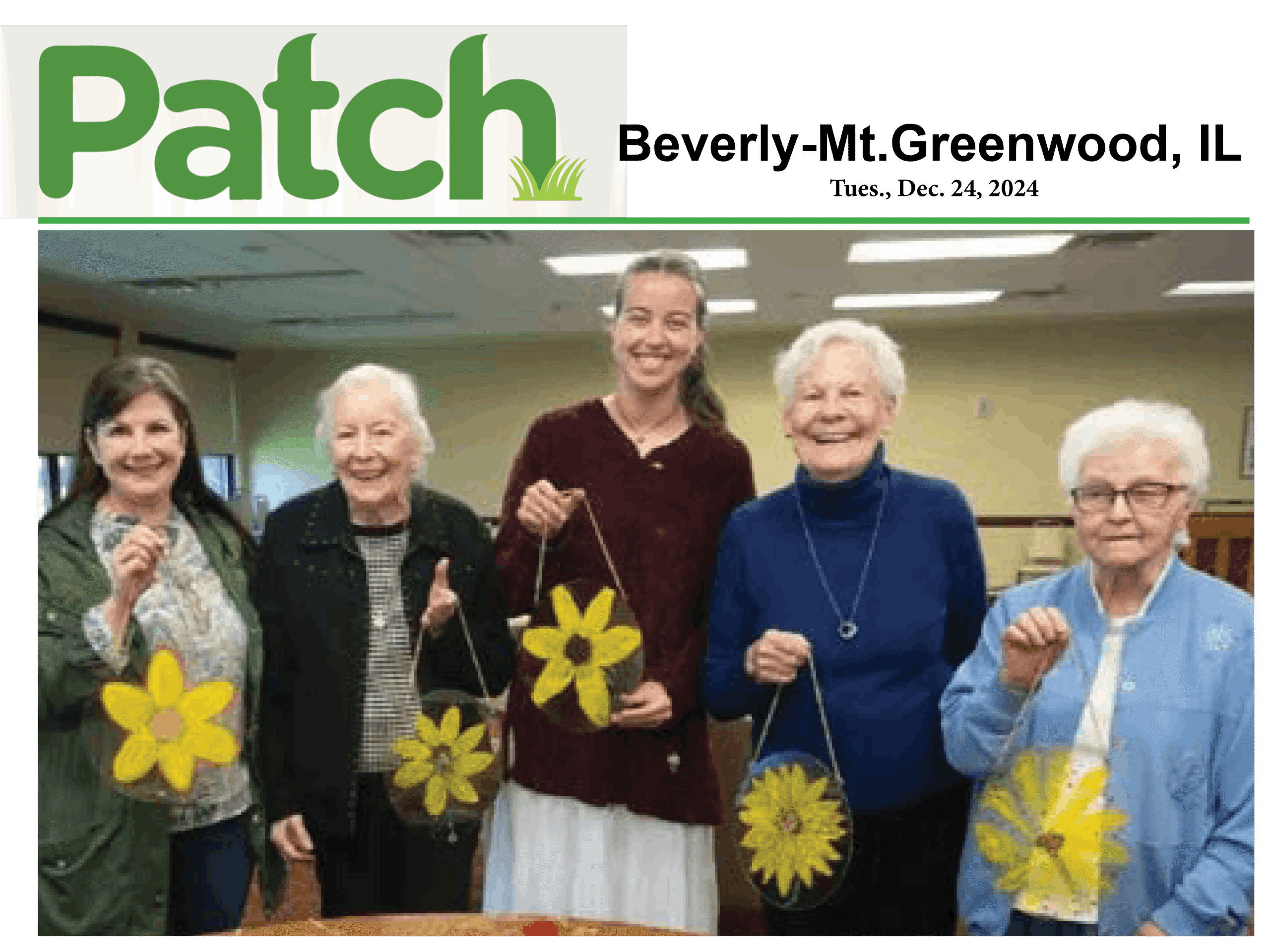Residents display an art project they completed