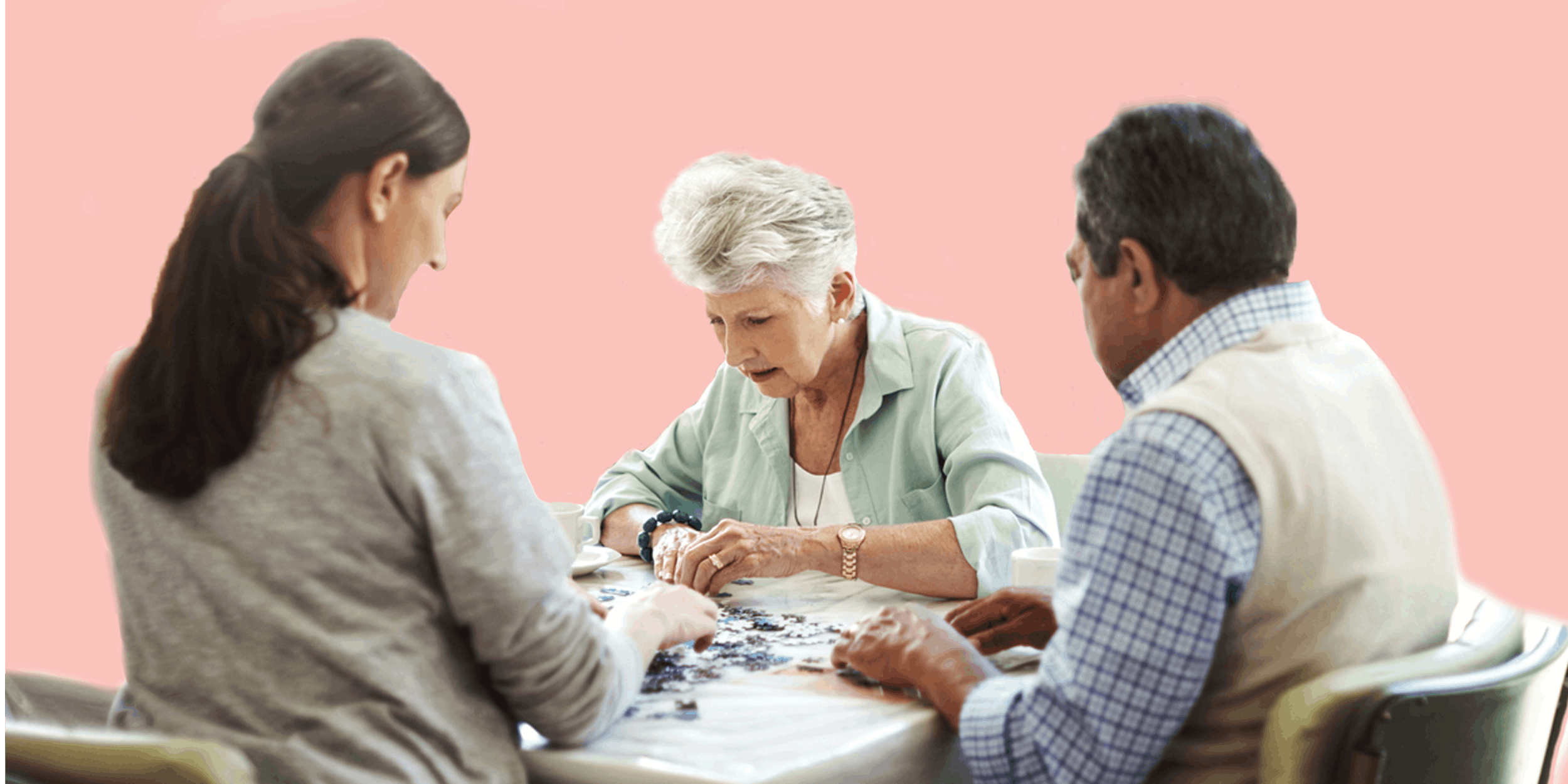 3 people working on a puzzle