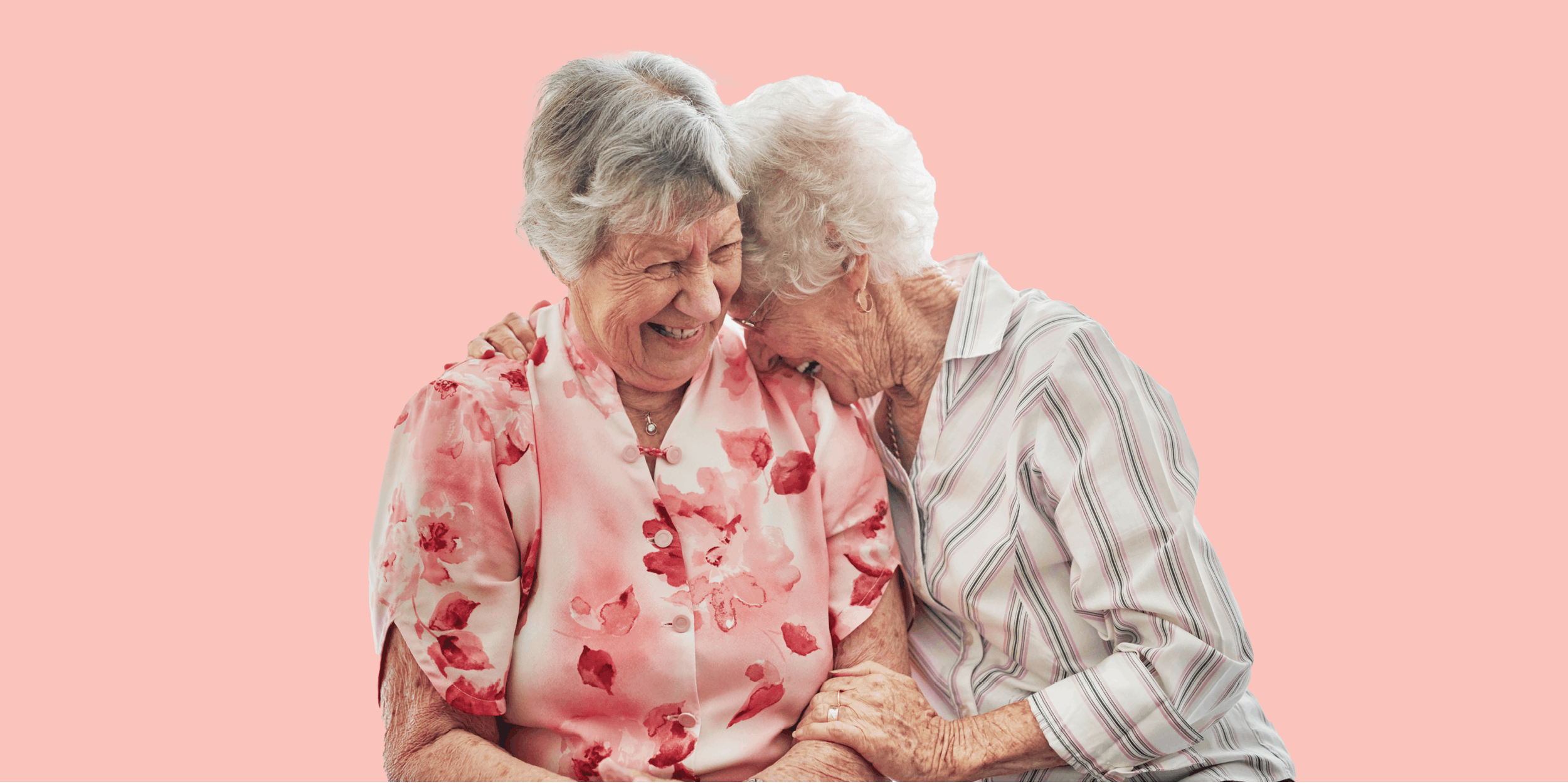 Two women laughing together