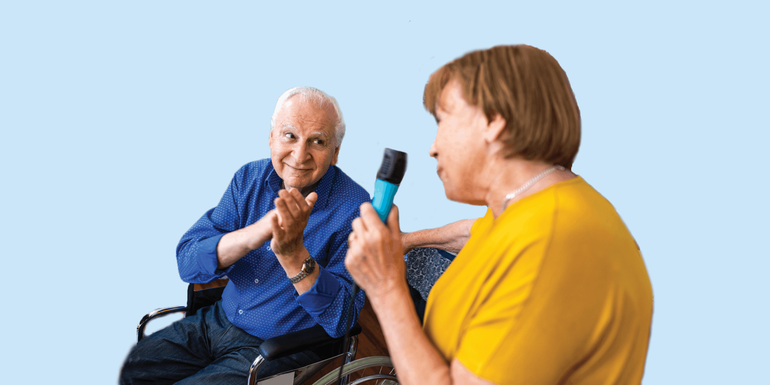 Two people with one holding a microphone