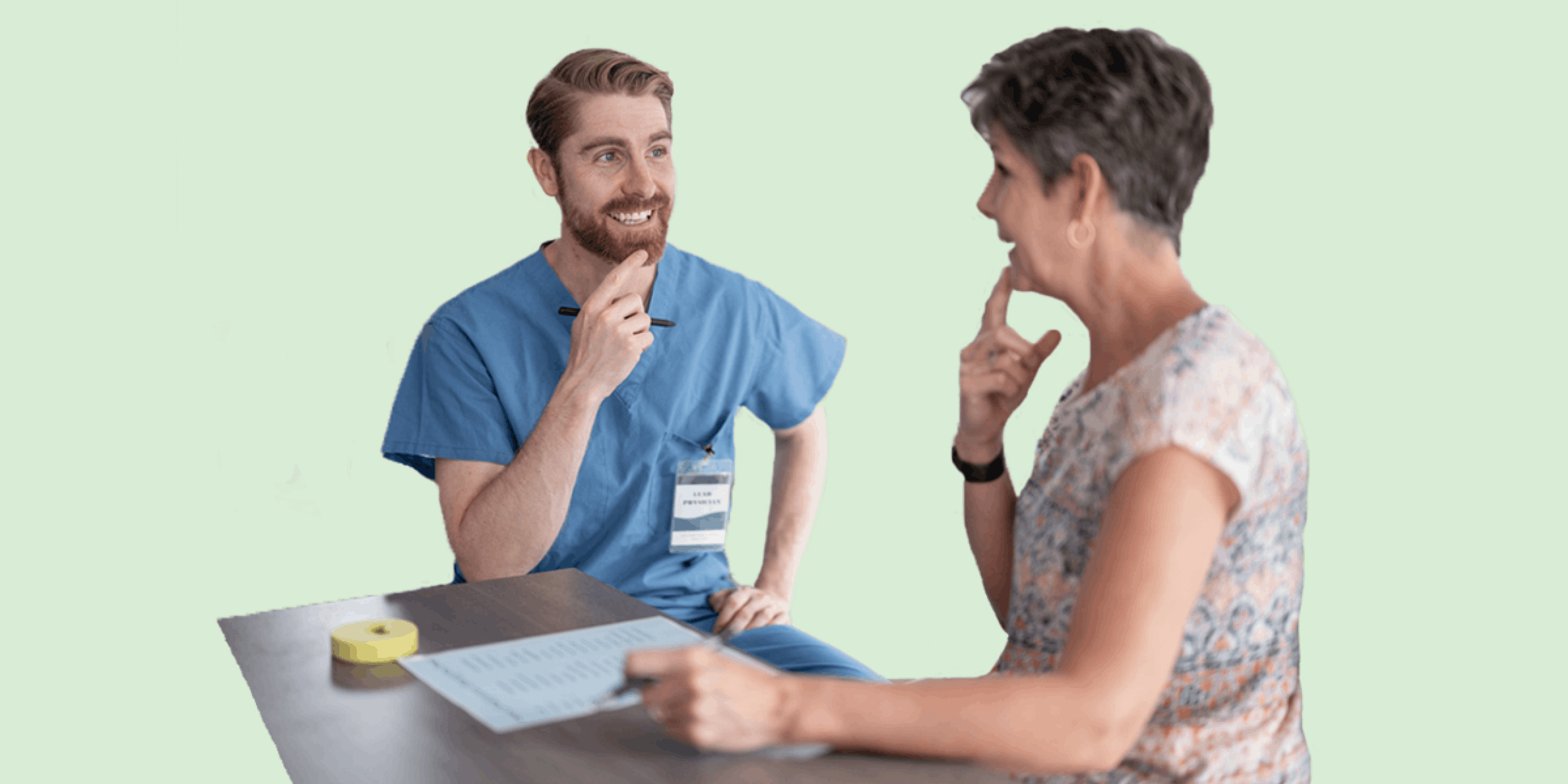 Woman speaking with rehab nurse